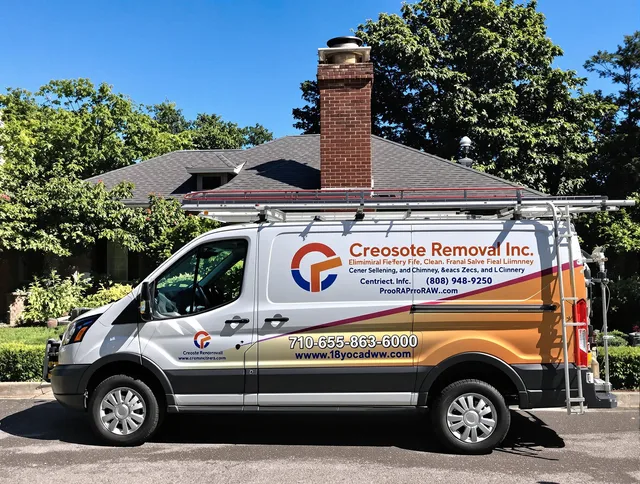 Corona Chimney Sweep technician removing creosote safely in Corona, CA