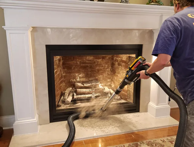 Fireplace cleaning performed by Corona Chimney Sweep in Corona, CA