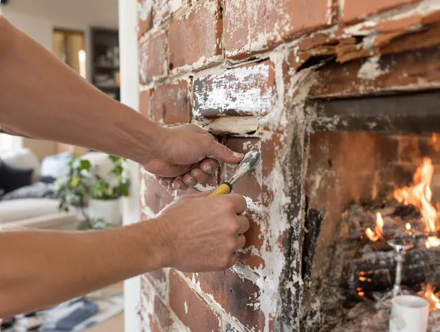 Routine fireplace repair by Corona Chimney Sweep in Corona, CA